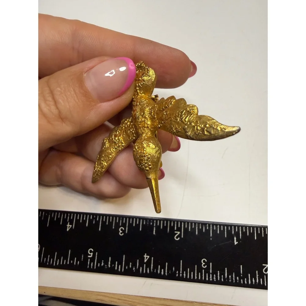Mamselle Gold Tone Textured Hummingbird Brooch Rhinestone Eye Vintage Pin